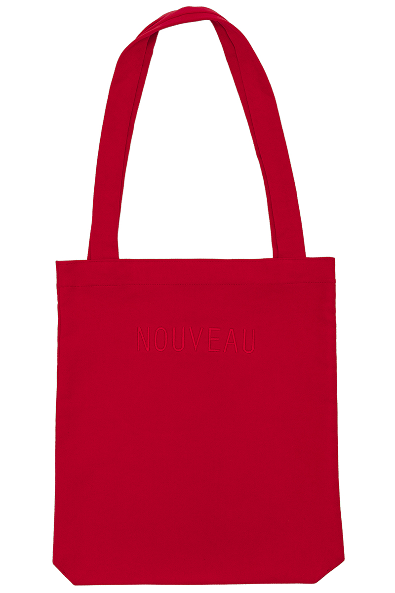 Red tote bag made out of certified organic moleskin with gives it a soft feel. Big enough to fit a computer or a few sketchbooks.